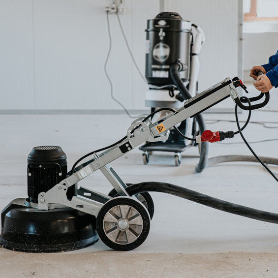 Contractor preparing for Epoxy Floor Coating in Farmington Hills, MI